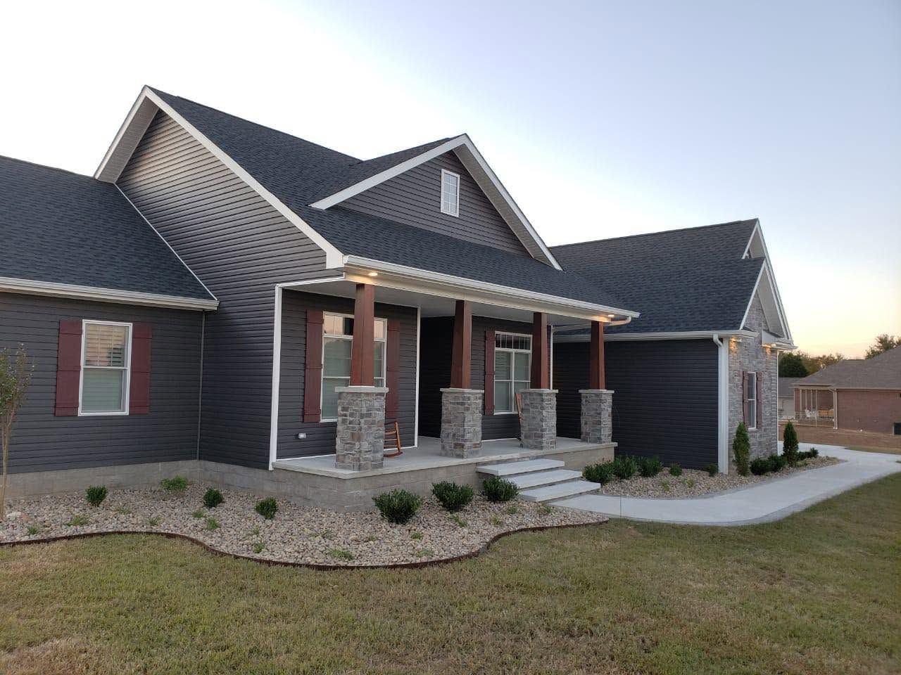 home with rock flower beds
