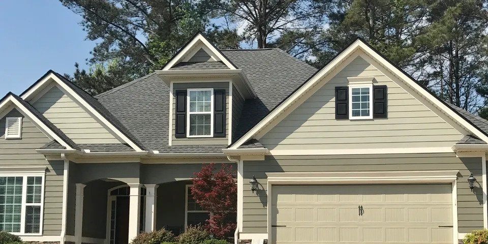 Exterior House With Modern Facade Painting — Smyrna, GA — Quality Works Roofing, LLC