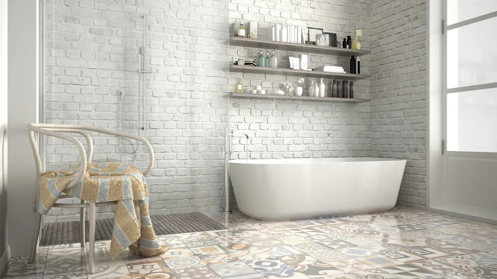 Bathroom with white brick walls, tub, shower, and patterned floor tile.
