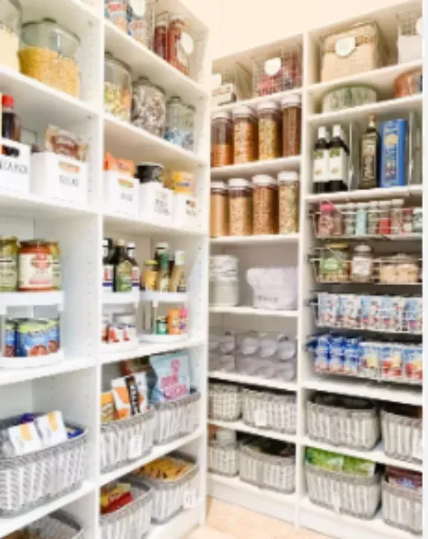 A pantry filled with lots of food and baskets.