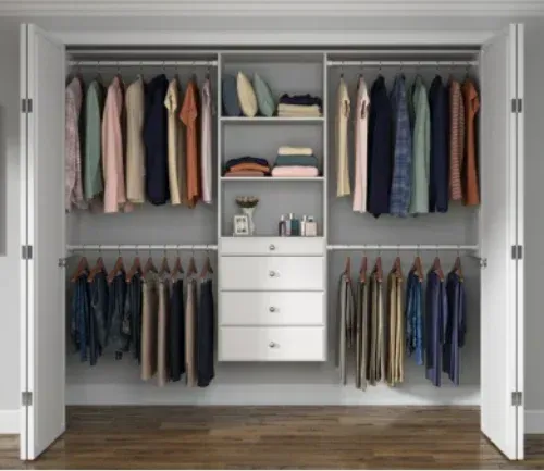 A closet filled with lots of clothes and drawers