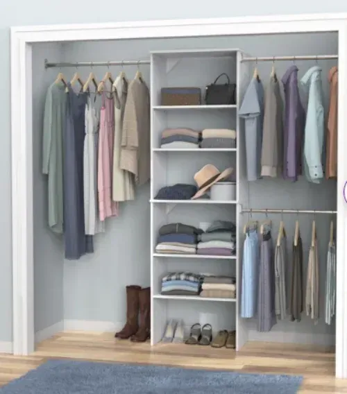 A closet filled with lots of clothes and shoes