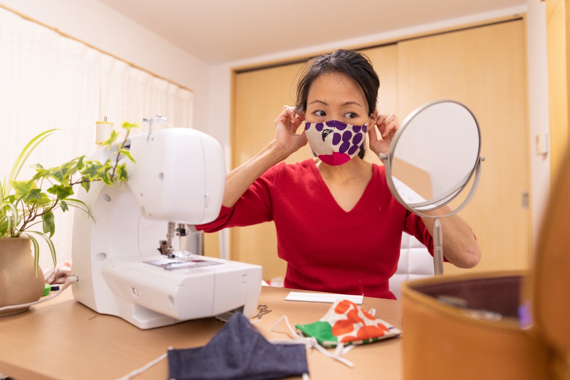 Two Women Using A Sewing Machine - Pooler, GA - Moye's Sewing Centers Inc