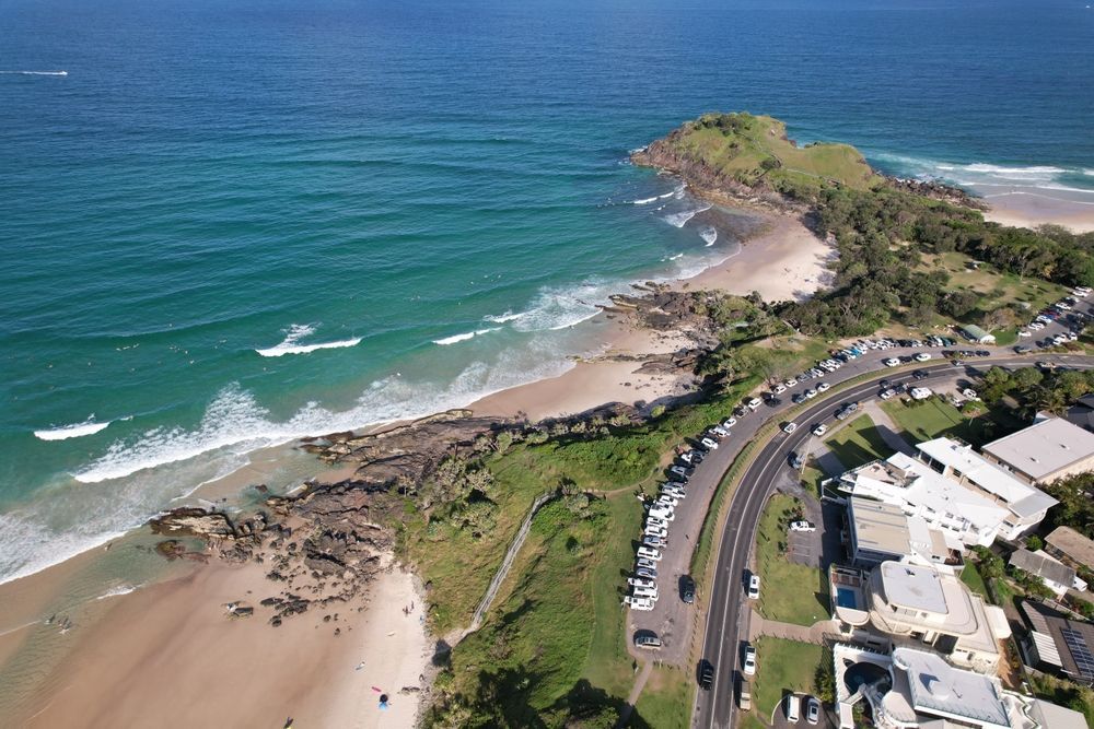Aerial View of A Beach with Rocky Shoreline — Burnett Trees in Woonona, NSW