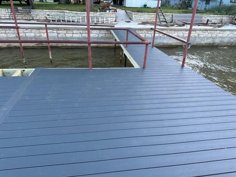 A dock with a staircase leading to the water