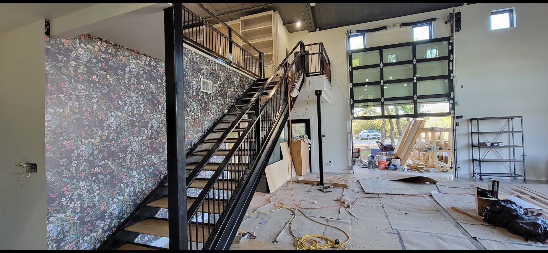 There is a staircase in the middle of the room.