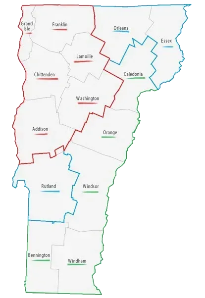 A group of men are standing around looking at a tablet.