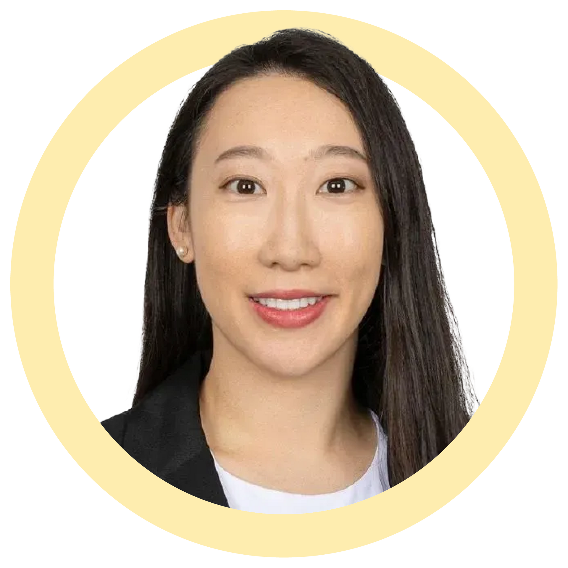 Woman with long dark hair, wearing a black blazer and white shirt, smiling in a yellow circle.