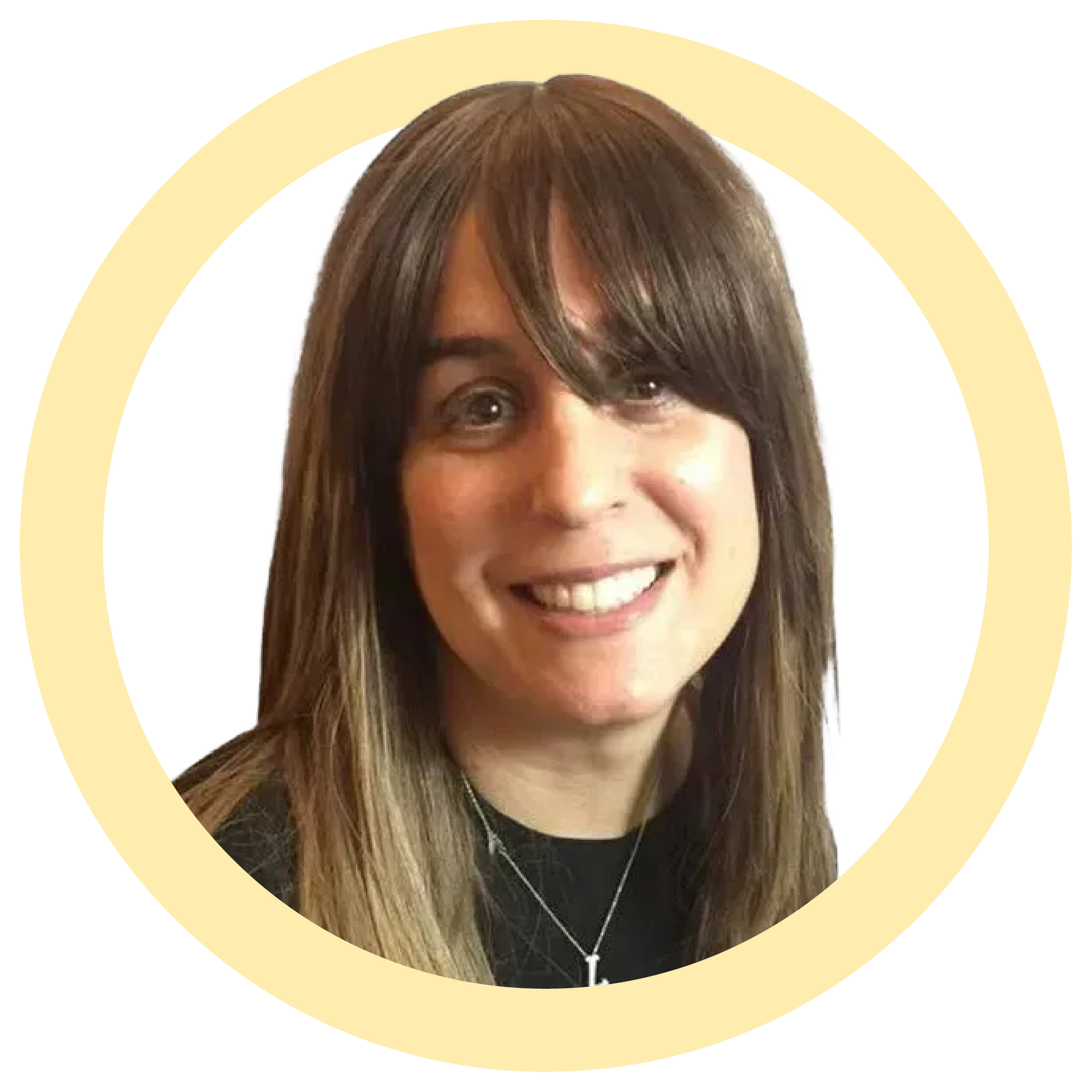 Woman with long brown hair, smiling, wearing a black shirt and necklace.