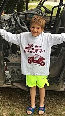 man riding in a four wheeler