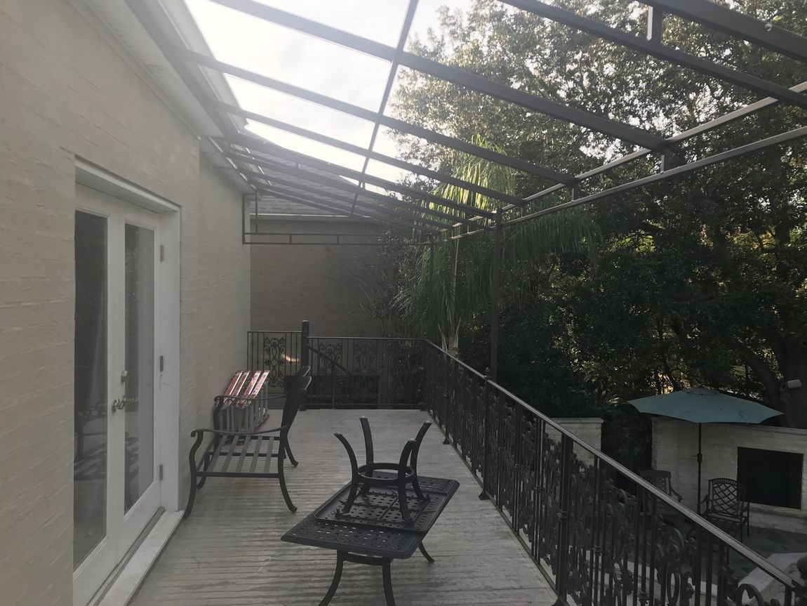 Awnings Installation — Awnings Being Installed On A Terrace in Chalmette, LA