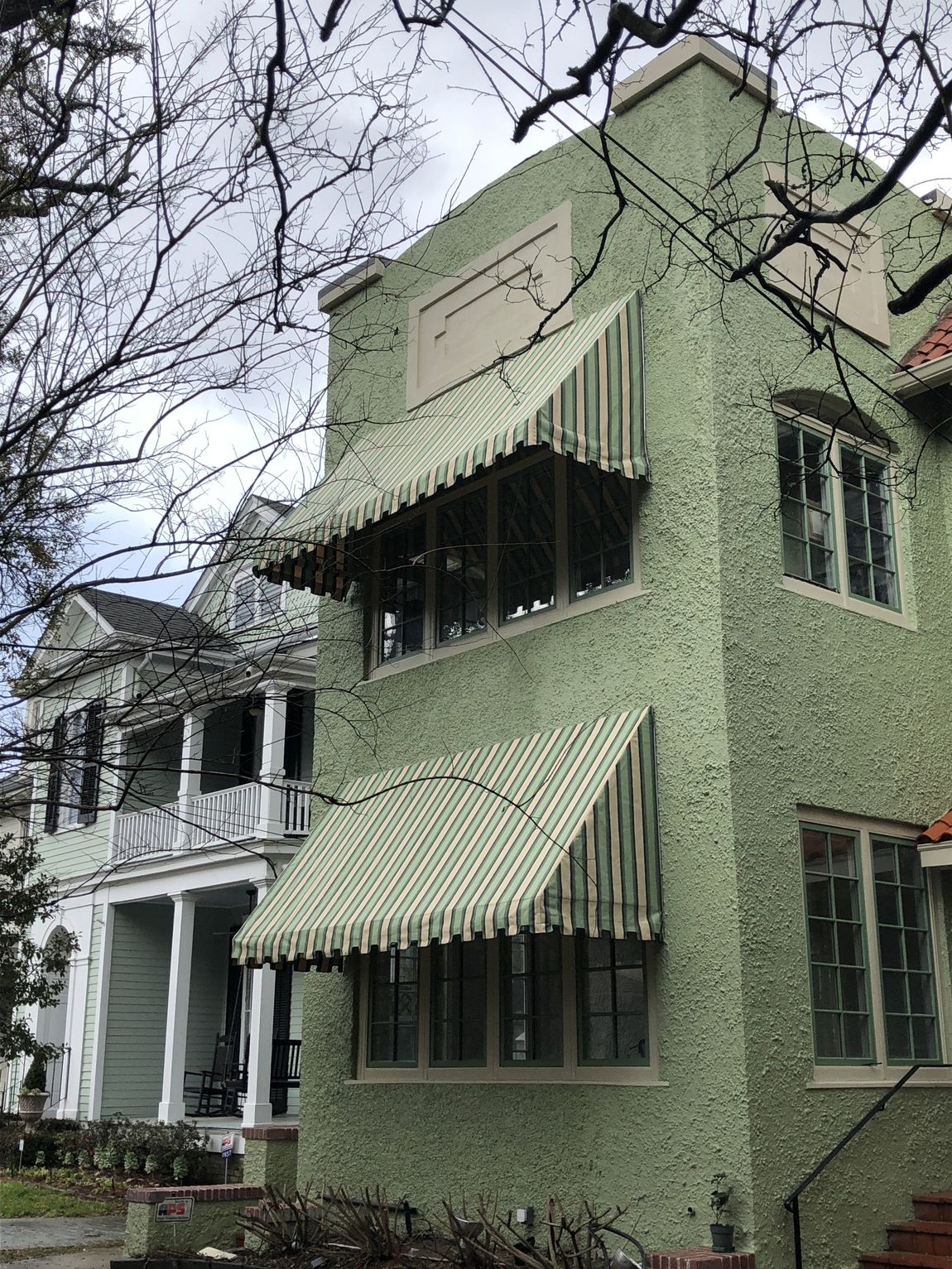 Galvanized Pipe Frames — Two Story  Building With Awnings in Chalmette, LA