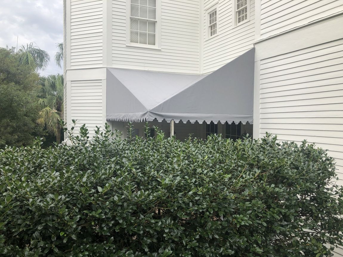 Custom Canopy Designs — Gray Canopy Installed On A White House in Chalmette, LA