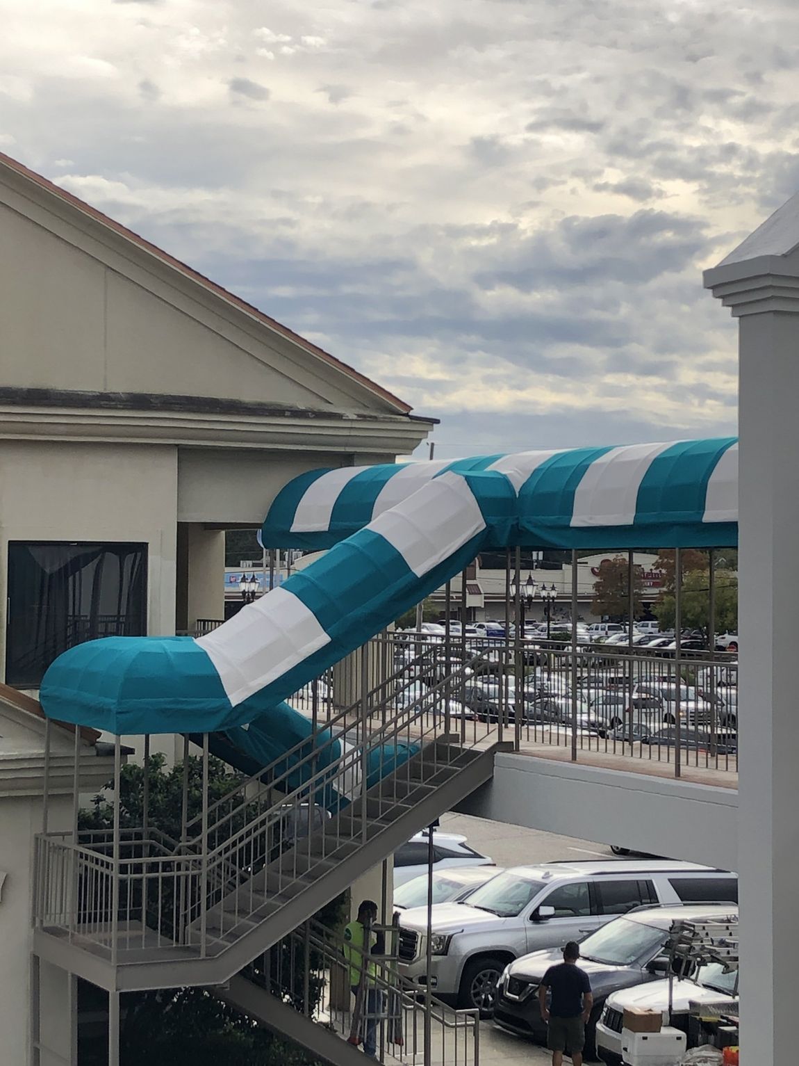 Foster Custom Awnings — Oval Canopies Installed On A Hallway And Stairs in Chalmette, LA