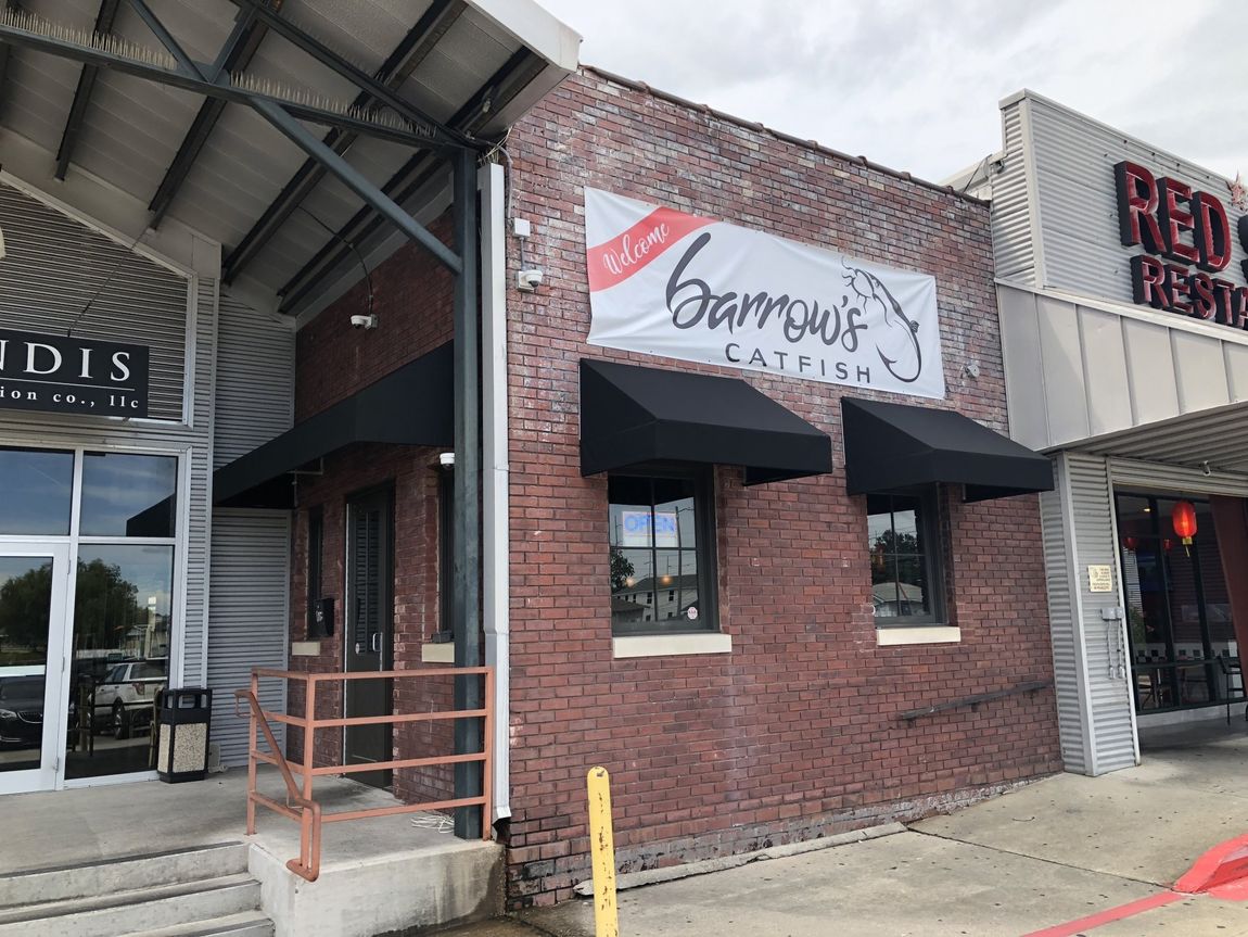 Commercial Stationery — Black Awnings Installed On Windows And Door in Chalmette, LA