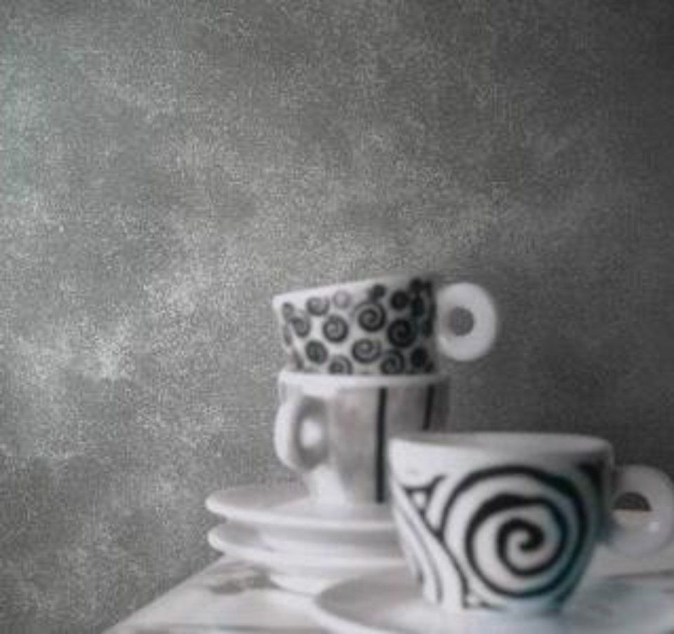 parete grigia con effetto spatolato