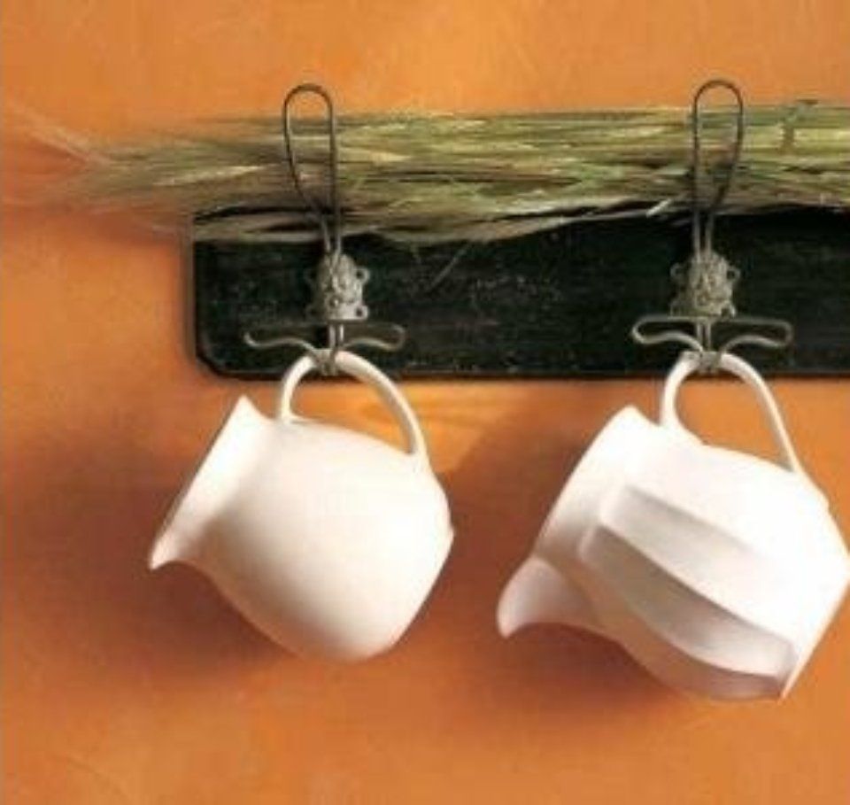 supporto fatto a mano per appendere brocche