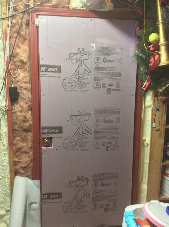 A door with a piece of styrofoam on it.