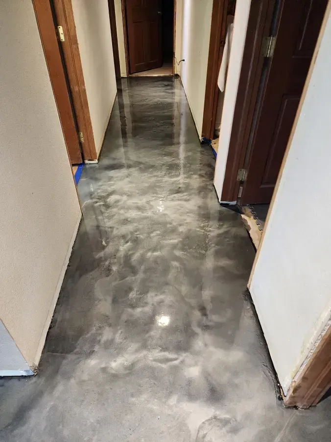 Hallway with a metallic epoxy floor.