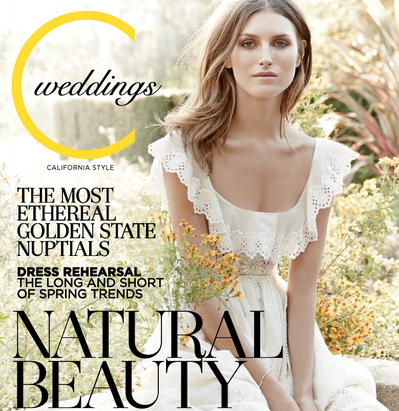 A woman in a white dress is on the cover of weddings magazine
