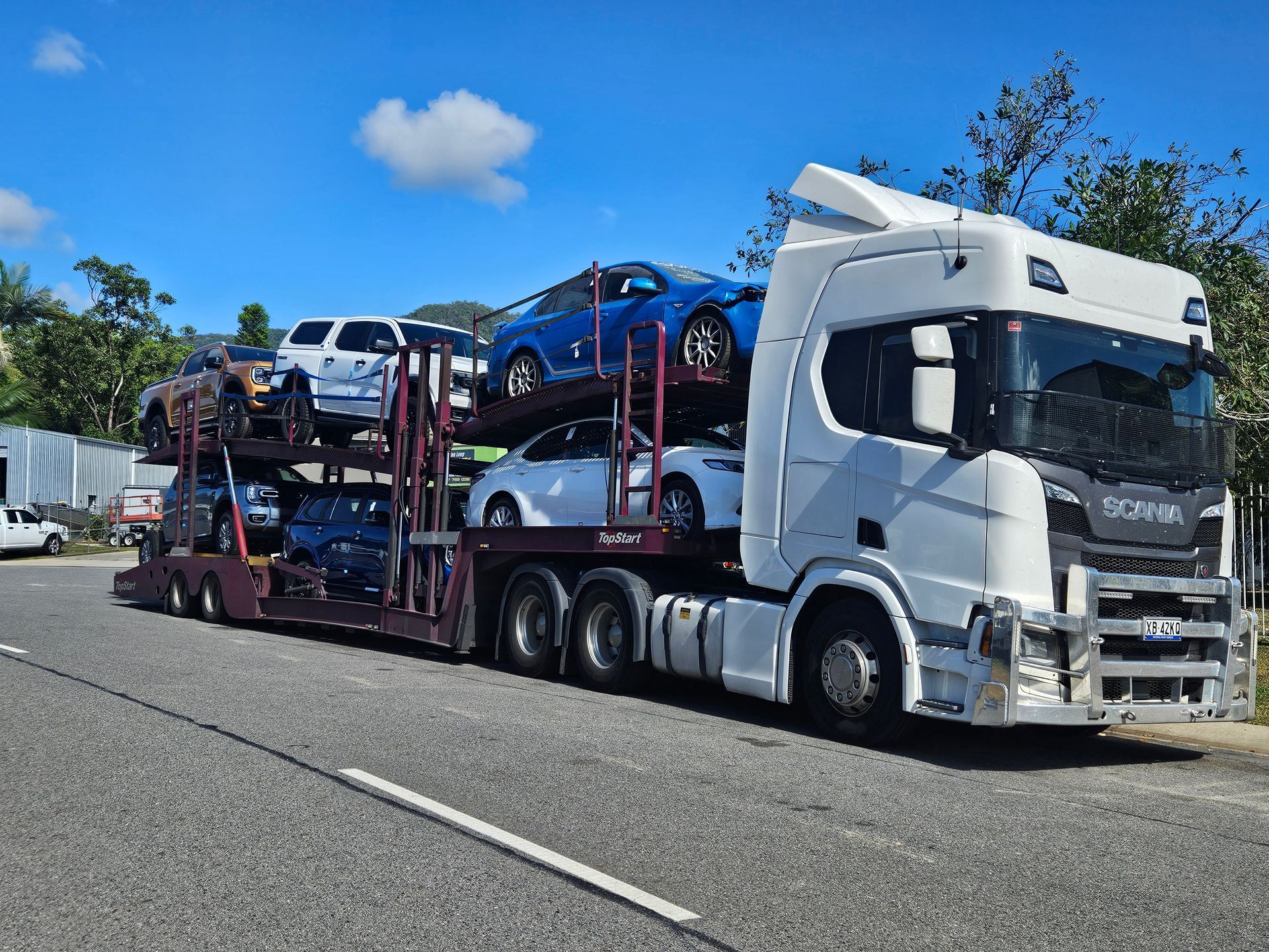 a Car Carrier Truck Transporting Multiple Vehicles — Alfie's Towing in Coen, QLD