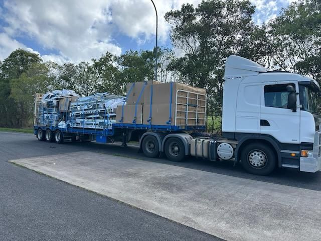 White Semi-truck Hauling a Trailer — Alfie's Towing in Bentley Park, QLD