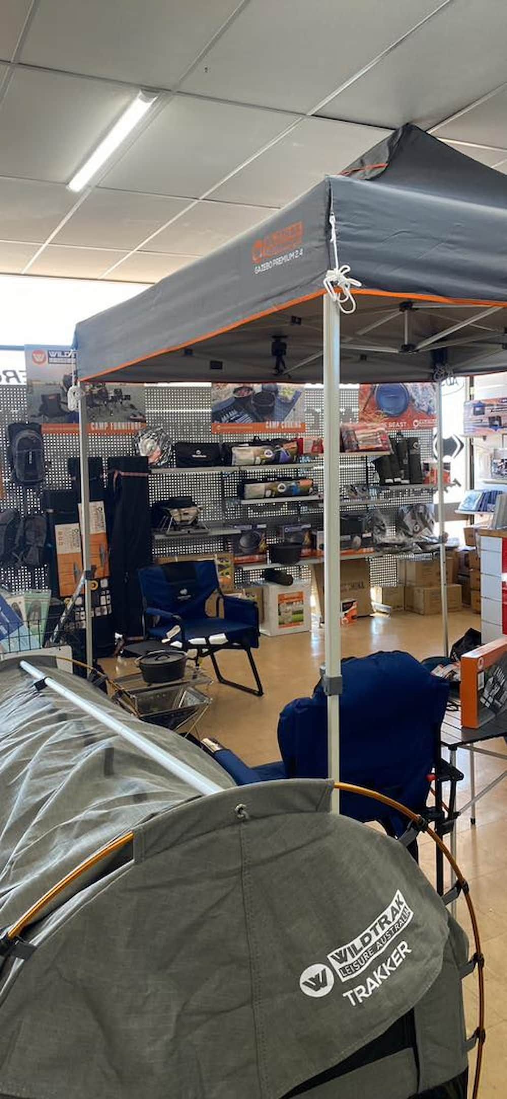 A Tent Is Sitting Under A Canopy In A Store  — Posties Caravans Boats Small Engines Inverell In Inverell, NSW