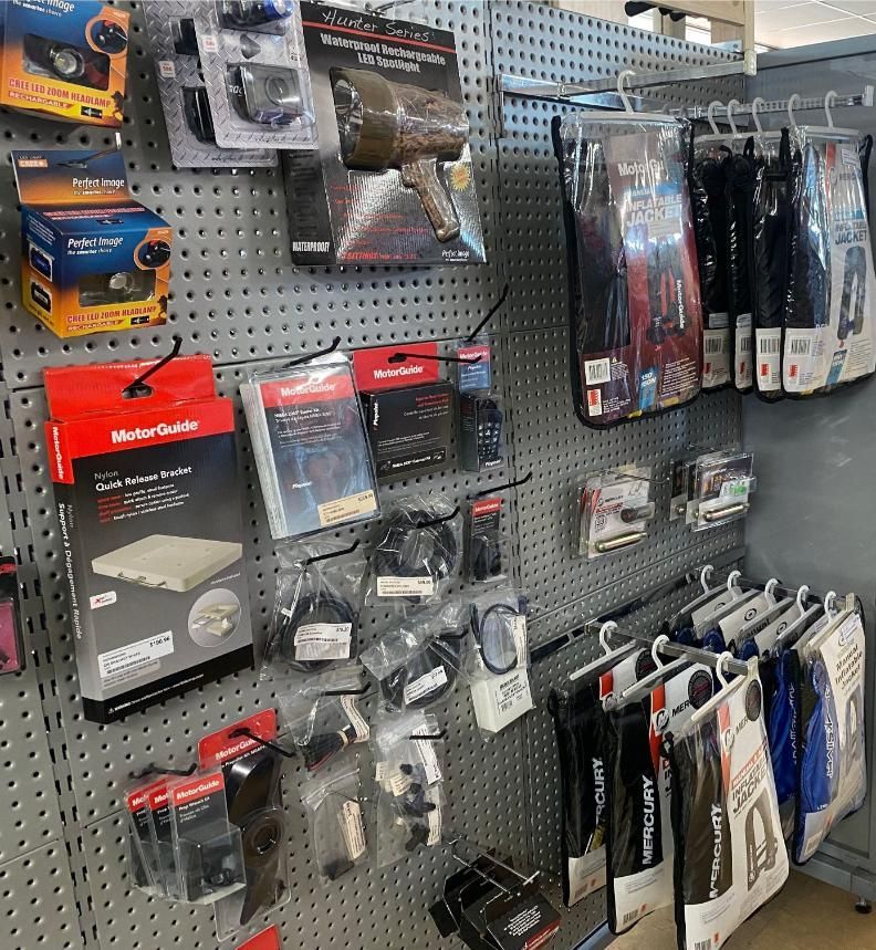 A Wall Filled With Lots Of Different Types Of Products — Posties Caravans Boats Small Engines Inverell In Armidale, NSW