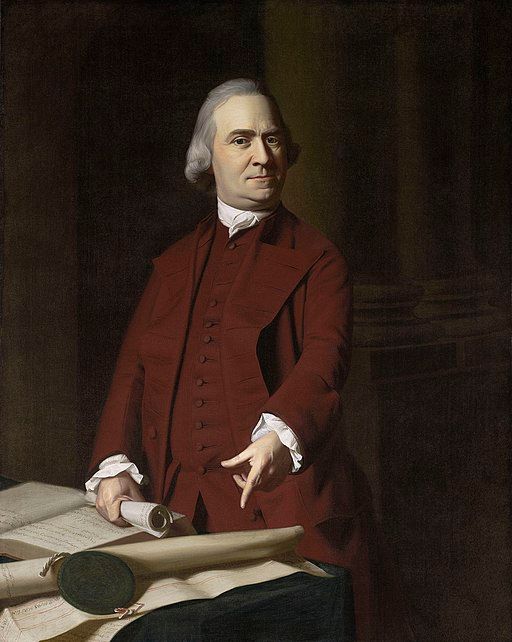 A painting of a man in a red suit holding a scroll samuel adams