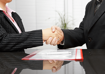 Lawyer and client handshaking — Lawyer in Merrillville, IN