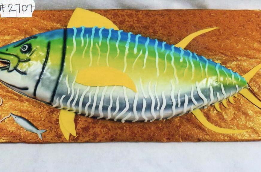 A painting of a fish with the number 27 on it