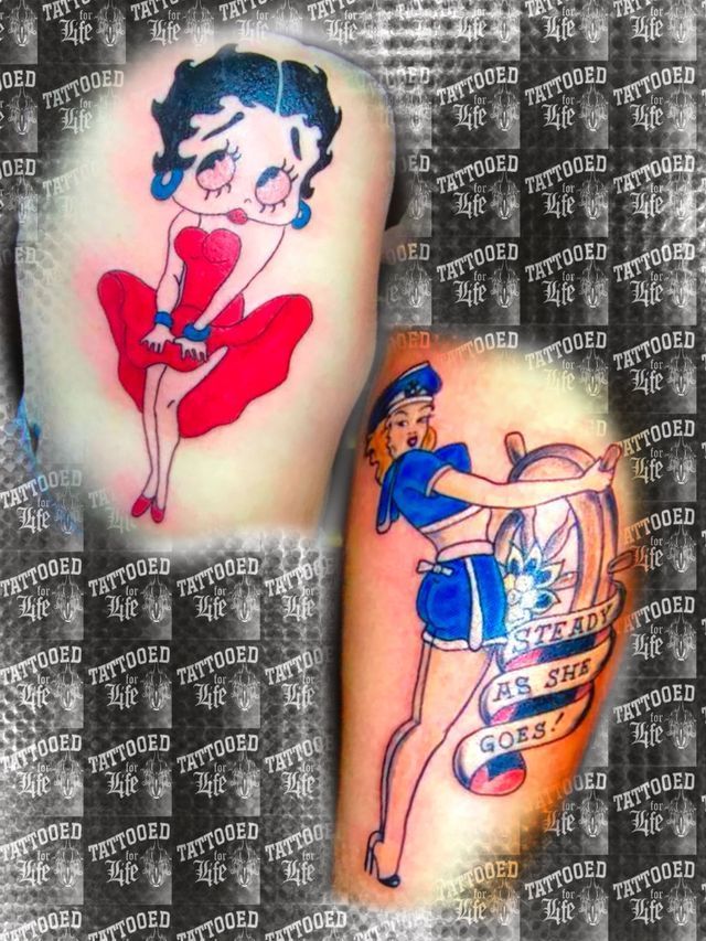 A woman has a tattoo of betty boop on her arm.