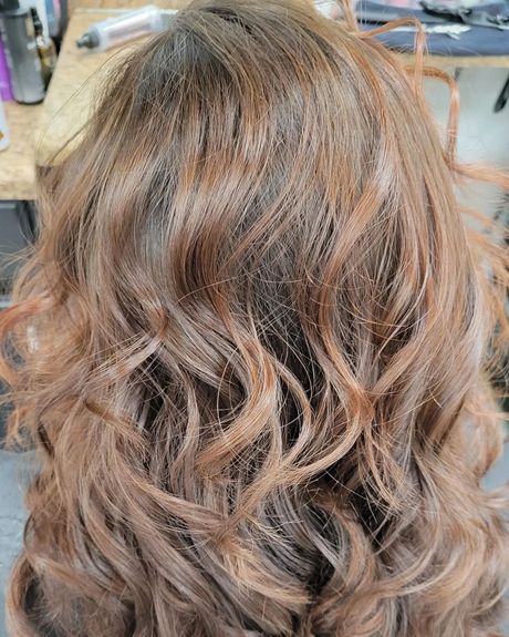 A close up of a woman 's hair in a salon.