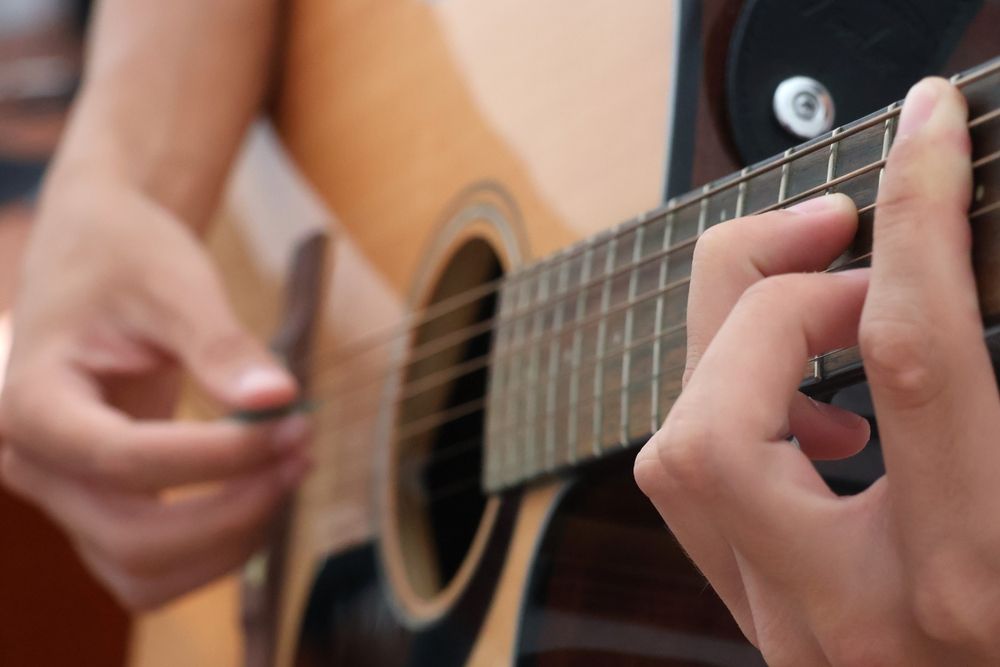 A treble clef and music notes on a white background