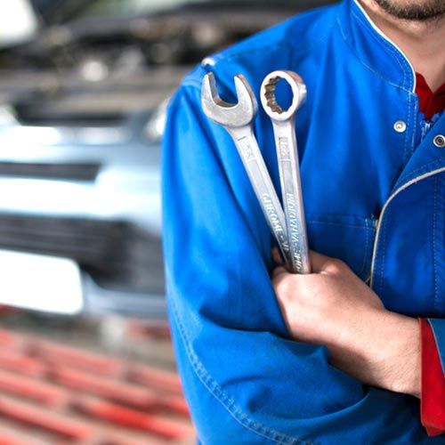 Auto Mechanics — Hand of Car Mechanic with Wrench in Santa Cruz, CA