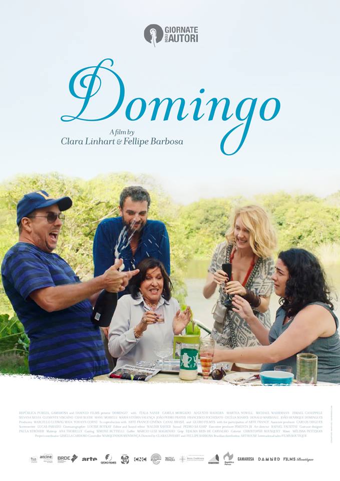 Um pôster do filme de domingo mostra um grupo de pessoas sentadas ao redor de uma mesa.