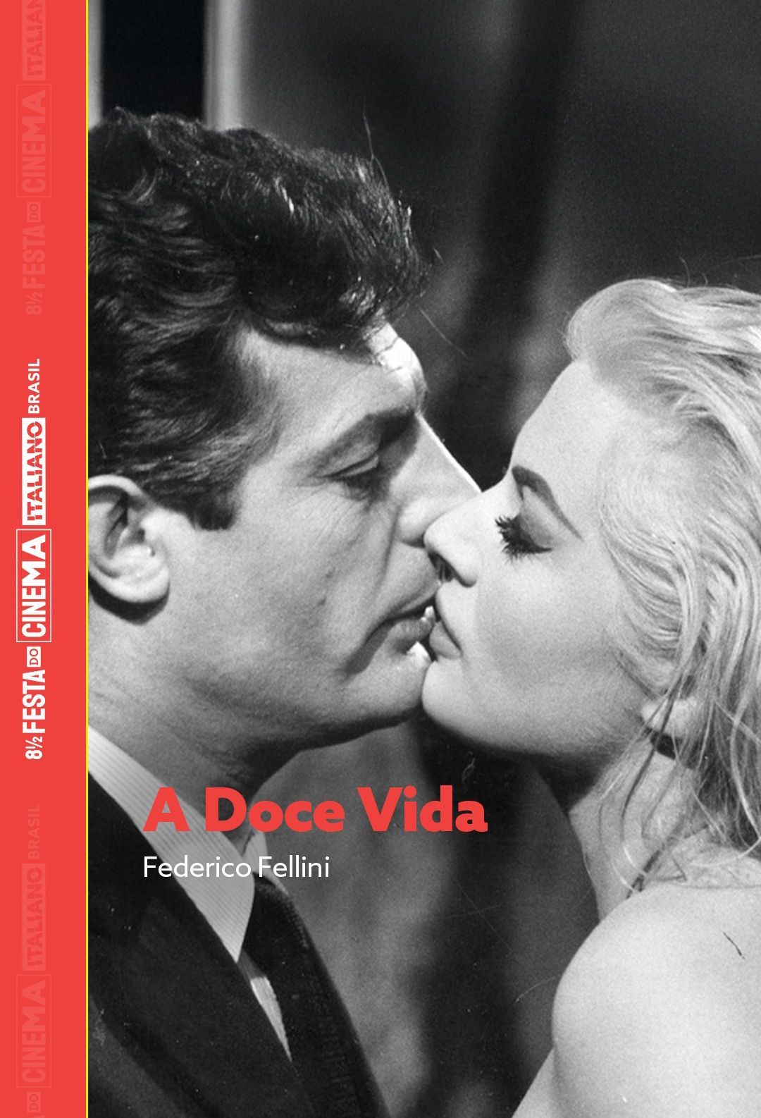 Um homem e uma mulher caminham por uma rua estreita.