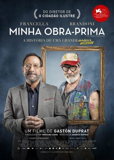 Um pôster do filme minha obra-prima mostra dois homens próximos um do outro