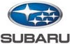 Subaru logo: a blue oval with silver trim, displaying a cluster of six stars, and the brand name 