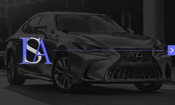 A grayscale sedan with the letters 