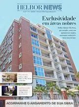 Um prédio de tijolos com muitas janelas na capa de um jornal.