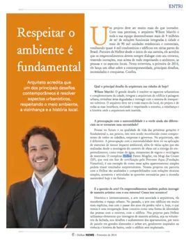 Um homem de terno e camisa branca está sorrindo em um artigo de jornal.