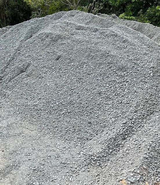 A Row Of White Bags With Blue Straps Are Lined Up On The Ground — Zappala Raw Materials Pty Ltd In Edmonton, QLD