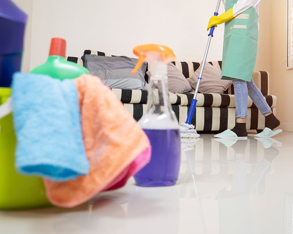 Worker Mopping House Floor — Danbury, CT — J & P Cleaning Service