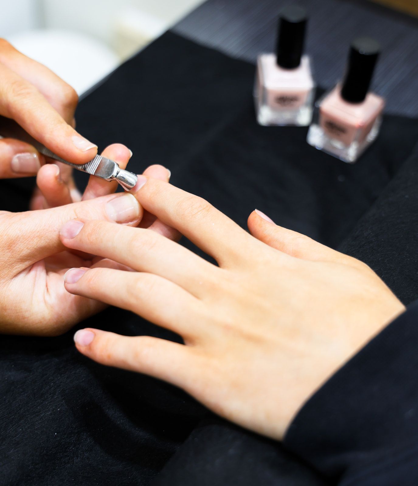 Hand with Cuticle Clipper - Siva Beauty, Body and Soul in Bowral, NSW