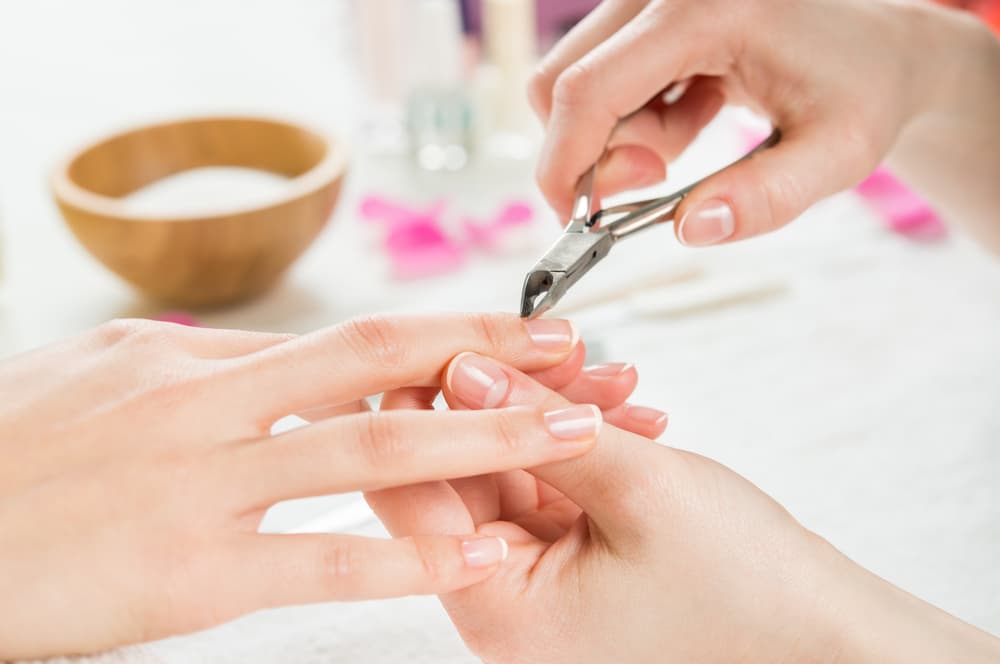 Hand with Cuticle Clipper - Siva Beauty, Body and Soul in Bowral, NSW
