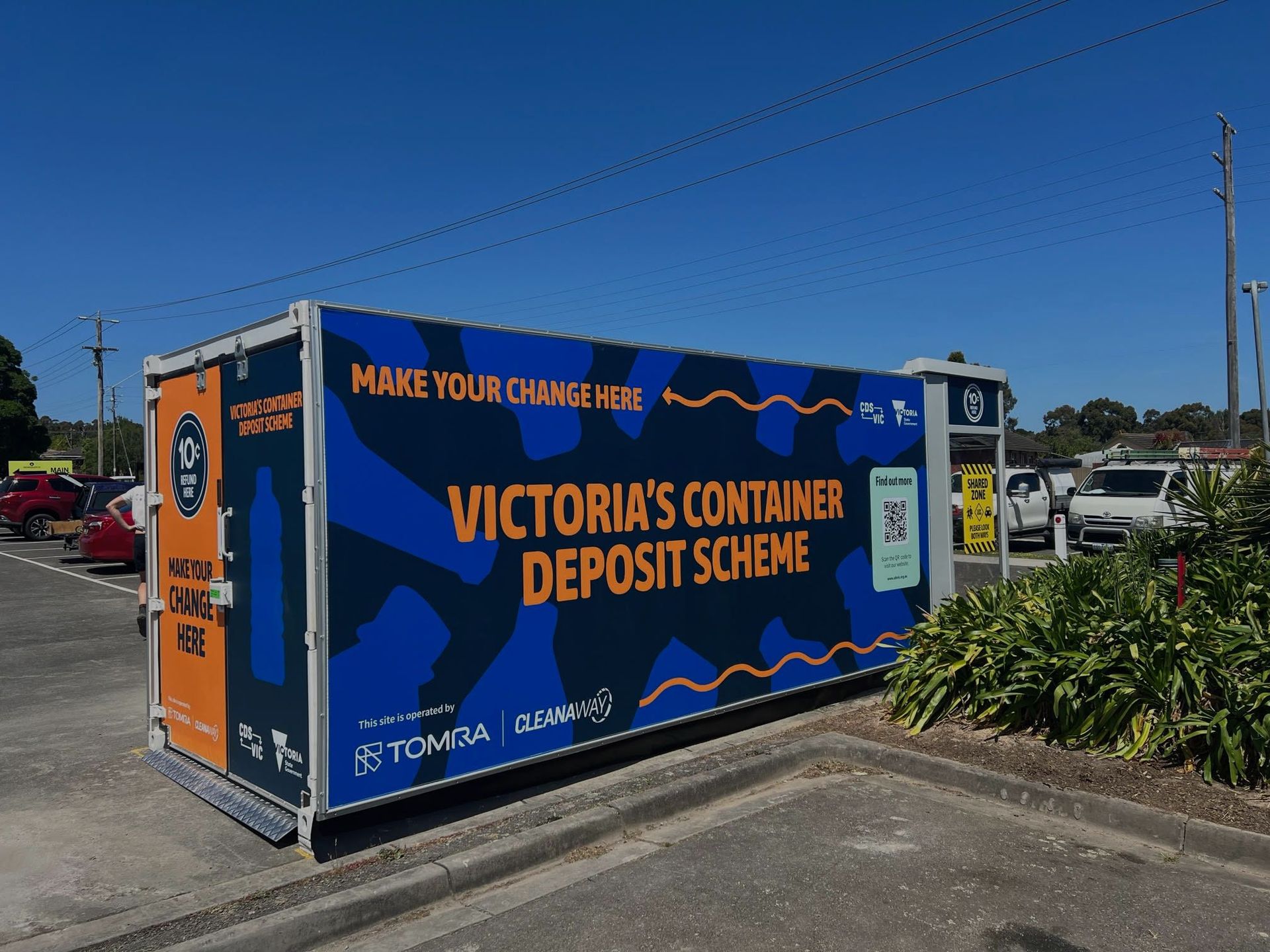 a victoria 's container deposit scheme in a parking lot