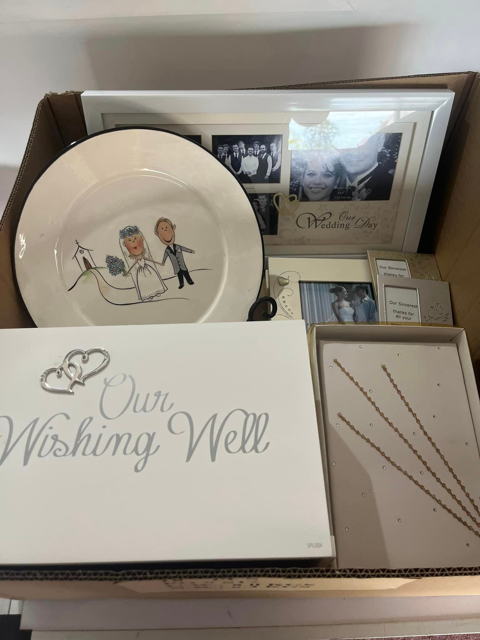 A Table With a Bunch of Items on It — Jimani Trophies & Engraving In Dapto, NSW