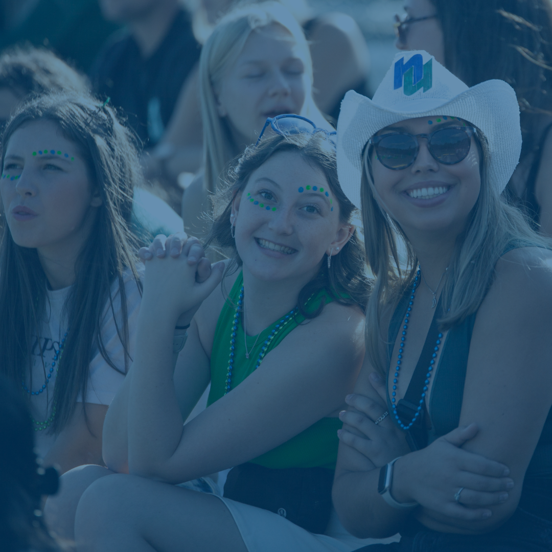 A mother and daughter looking into the camera.