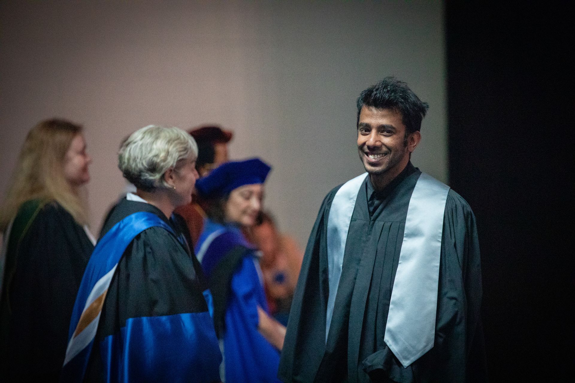 Nipissing University graduate posing for a picture